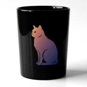 A mug featuring a cat illustration with a scenic mountain backdrop, combining nature and pet themes. 