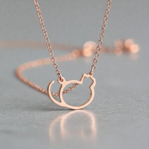 Minimalist and modern cat silhouette necklace in rose gold, a stylish piece of cat jewelry.